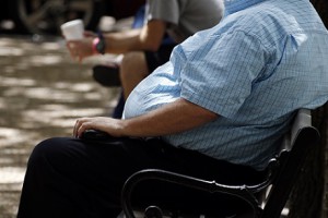 A heavy set man rests on a bench in Jackson, Miss., Thursday, Sept. 4, 2014. A report released Thursday by Trust for America's Health and the Robert Wood Johnson Foundation found adult obesity rates at 35.1 percent in both Mississippi and West Virginia have placed them with the highest rates of adult obesity in the nation. It marks the first time that a state has surpassed 35 percent. The study showed an alarming 20 states had obesity rates of 30 percent or higher in 2013, up from 12 states in 2010. Nine of the 10 fattest states are in the South. (AP Photo/Rogelio V. Solis)